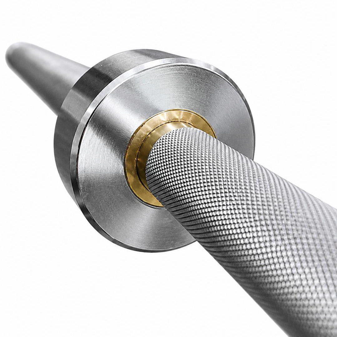 Close-up of a metal tool with a textured handle on a white background