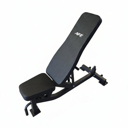 Black weight bench with 'AFe' branding on a wooden floor in a gym setting.