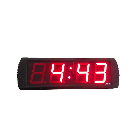 A person holds a black rectangular digital LED clock showing 4:43 in bright red digits. The clock has a small 'AFF' logo on the bottom right.