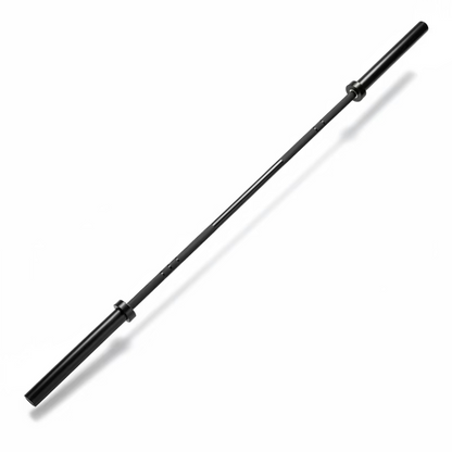 A black metal barbell resting diagonally on a gray wood-look laminate floor.