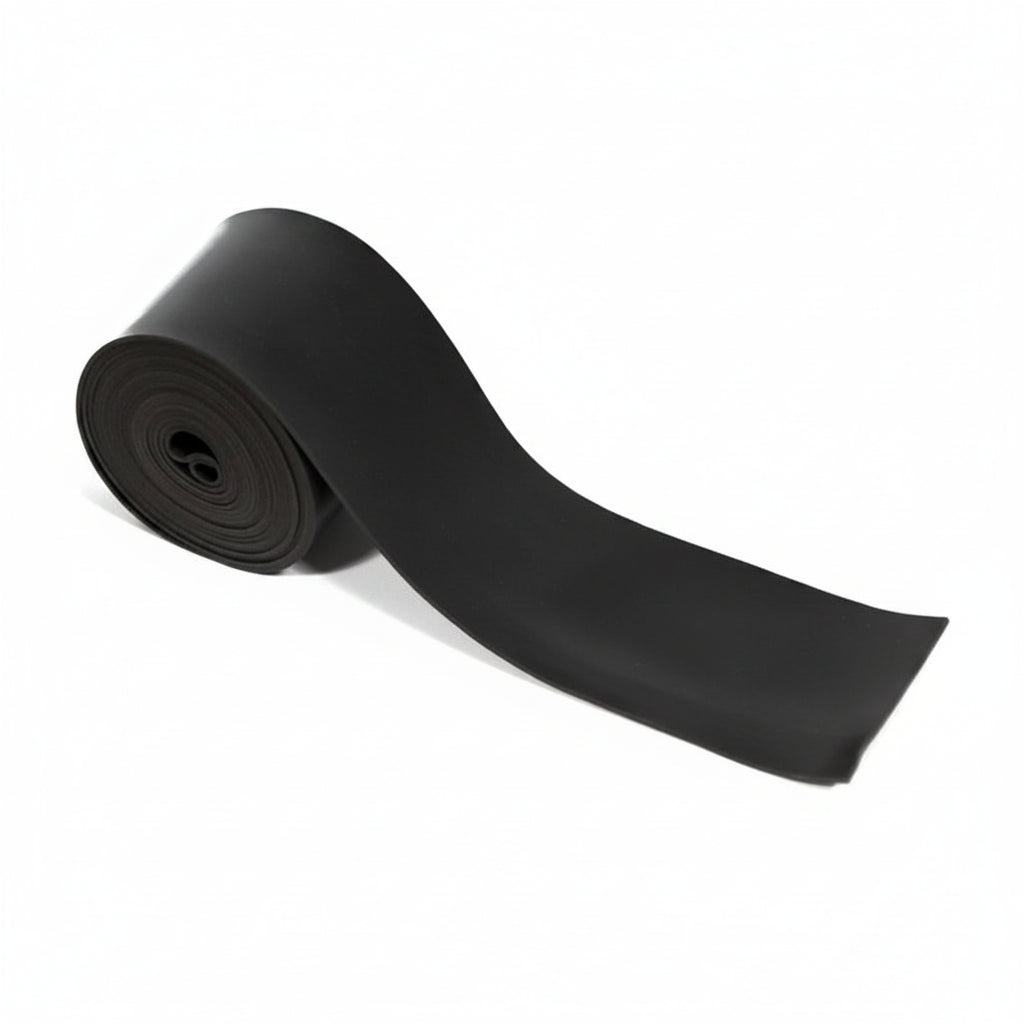 Roll of black band floss tape on a white background
