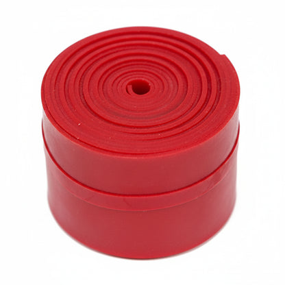 Red tape floss band roll on a white background