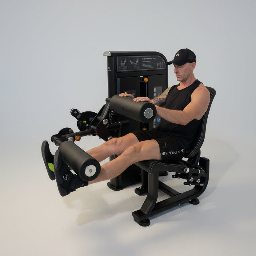 Person using a leg press machine in a gym setting