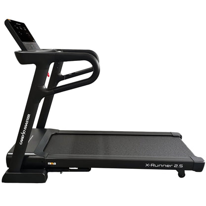 A black CardioMaster X-Runner 2.5 treadmill with a digital display screen and curved handlebars, shown from a side angle on a solid white background.