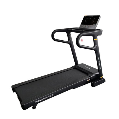 A black X-Runner 2.5 treadmill with a digital display screen on the handle frame, shown from a three-quarters angle against a solid white background.