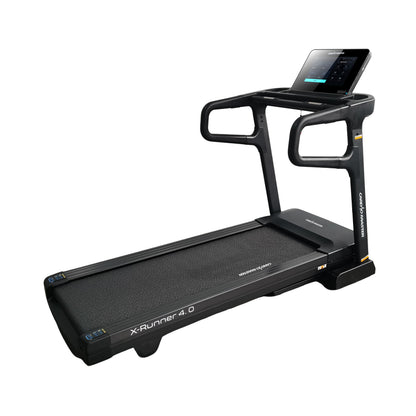 A black X-Runner 4.0 treadmill with an integrated digital display screen on the upper frame, shown from a three-quarters angle against a solid white background.
