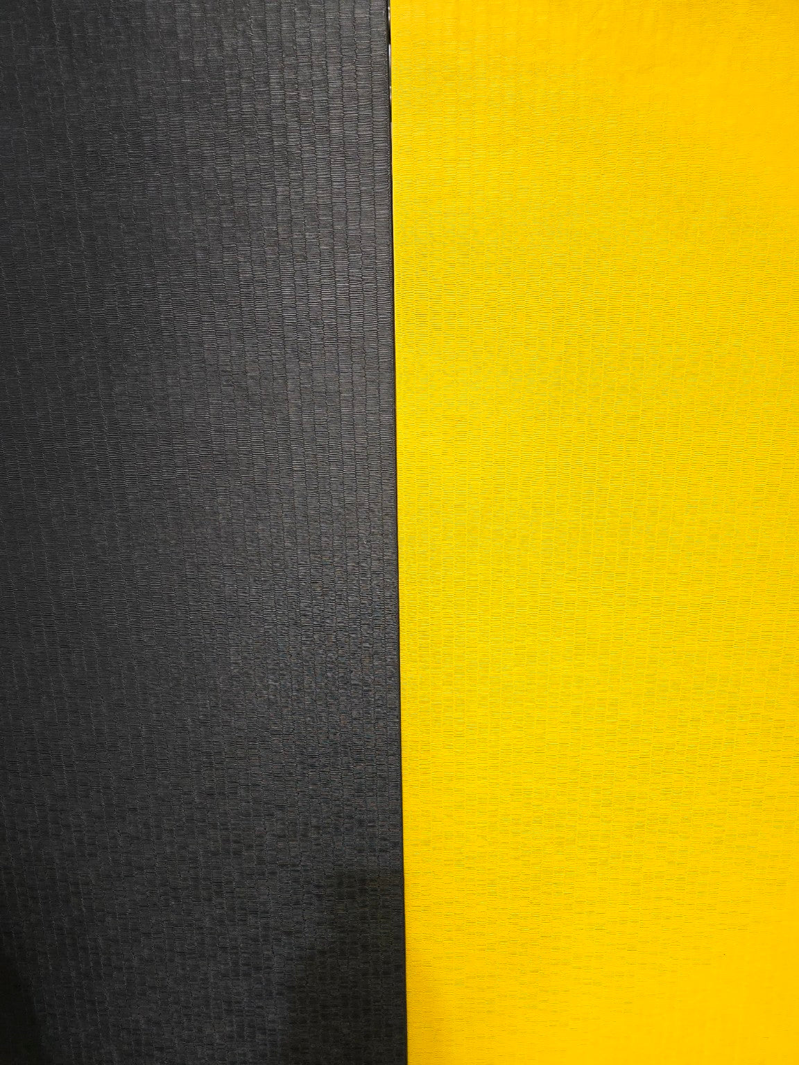 Two-tone fabric swatch with black and yellow sections