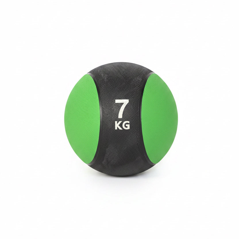 A 7 kg medicine ball with green and black