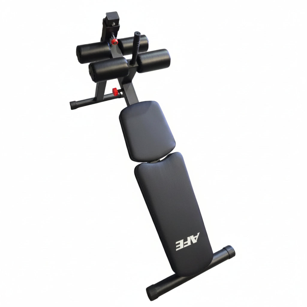 A black adjustable weight bench with a white AFE logo on the backrest, photographed in a warehouse or gym setting with stacked cardboard boxes and other exercise equipment in the background.