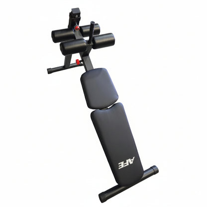 A black adjustable weight bench with a white AFE logo on the backrest, photographed in a warehouse or gym setting with stacked cardboard boxes and other exercise equipment in the background.