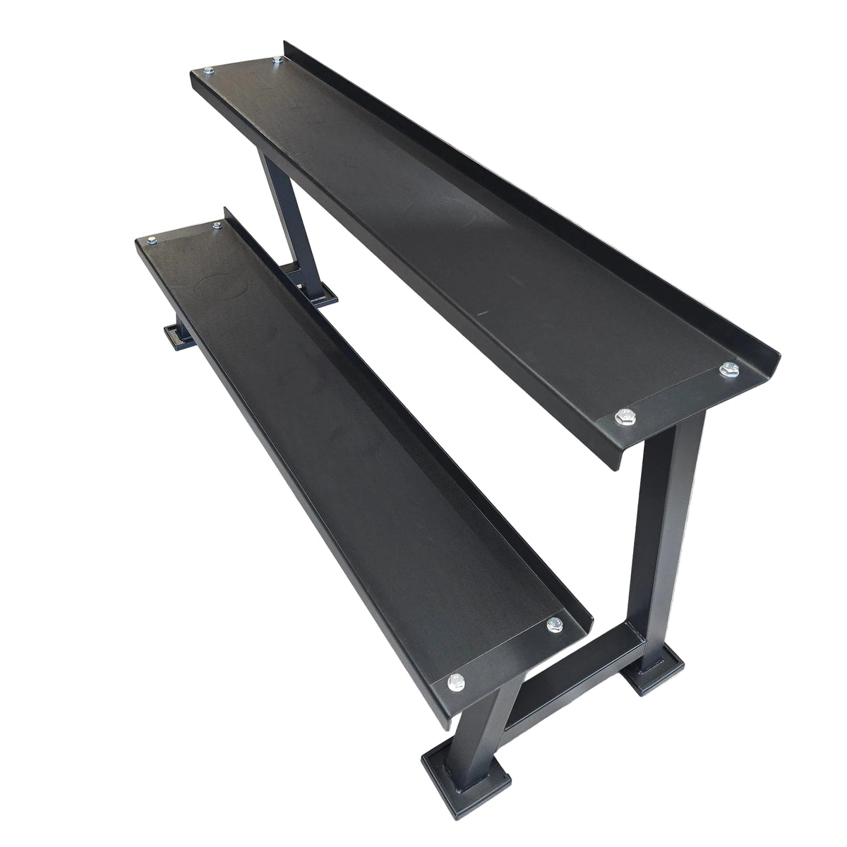 A black metal dual bench in a gym setting with gray wood-look flooring and exercise equipment in the background.