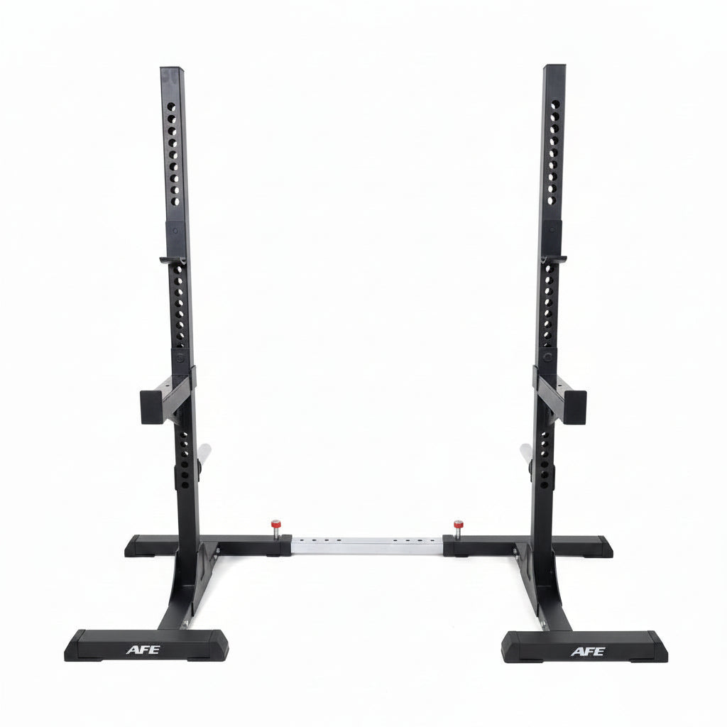 A black AFE power rack with a white fabric backdrop hanging between the uprights, set in a gym with wood-look flooring and exercise equipment in the background.